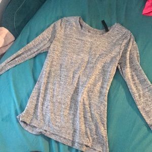Two grey long sleeve athletic shirts